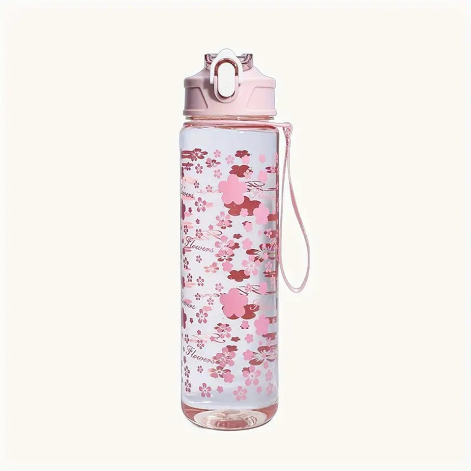 une bouteille pour transporter toutes vos boissons avec vous. Son design représente des fleurs de sakura roses. Elle a une paille intégrée et un bouchon anti-fuites