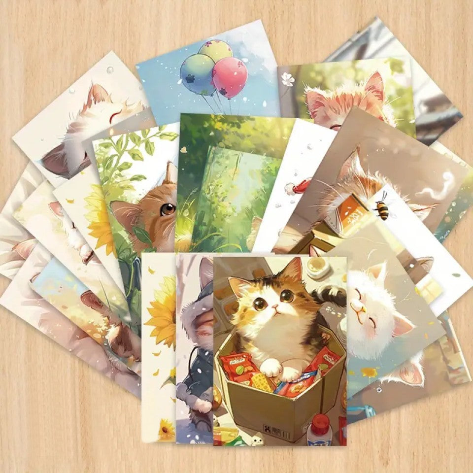 des cartes postales d'illustrations dessinées de chats de toutes les couleurs et dans des poses, des expressions et scènes différentes mais toujours pleine de tendresse et de douceur.