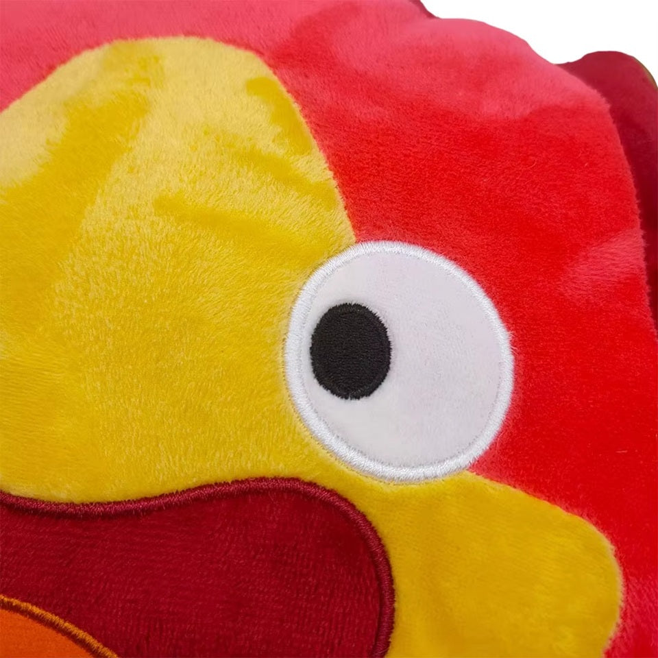 un coussin tout doux et moelleux de Calcifer, le petit démon brûlant du château ambulant