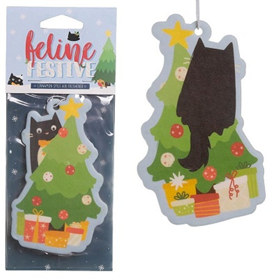 un désodorisant à suspendre en forme d'un adorable et espiègle chat noir qui grimpe dans un sapin de Noël. Hyper amusant, il sent l'orange épicée, odeur typique de la saison hivernale