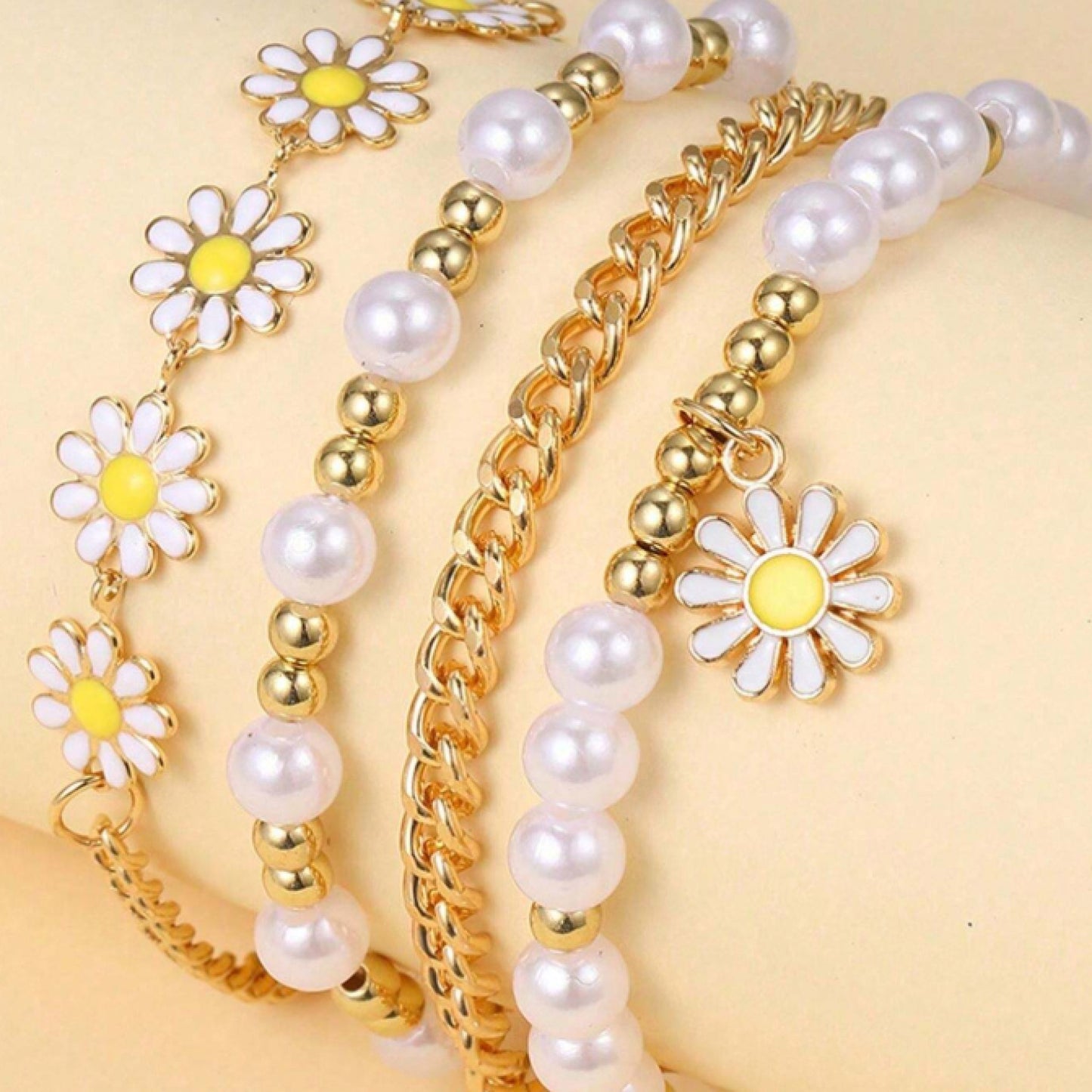 Ensemble de 4 bracelets marguerites et perles