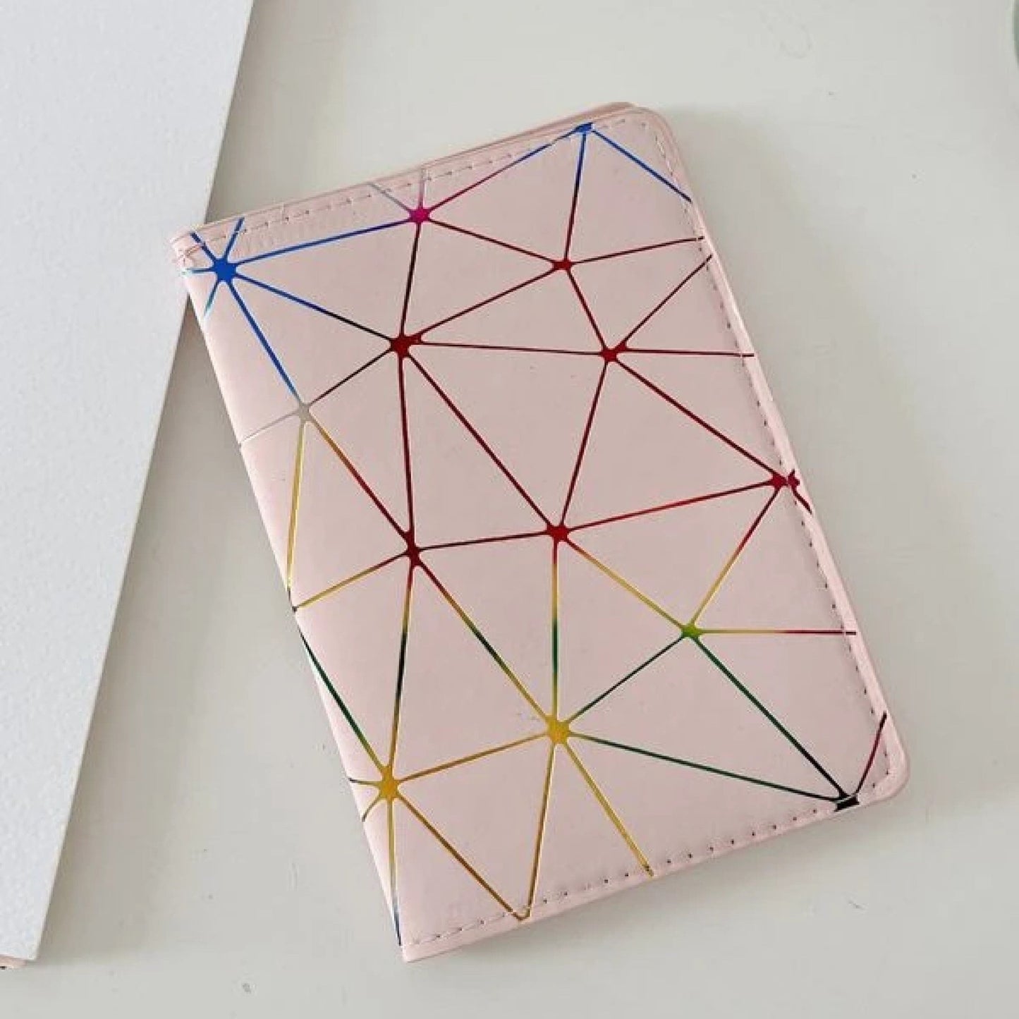 Etui à passeport rose à lignes néons