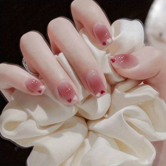 Faux ongles roses coeurs