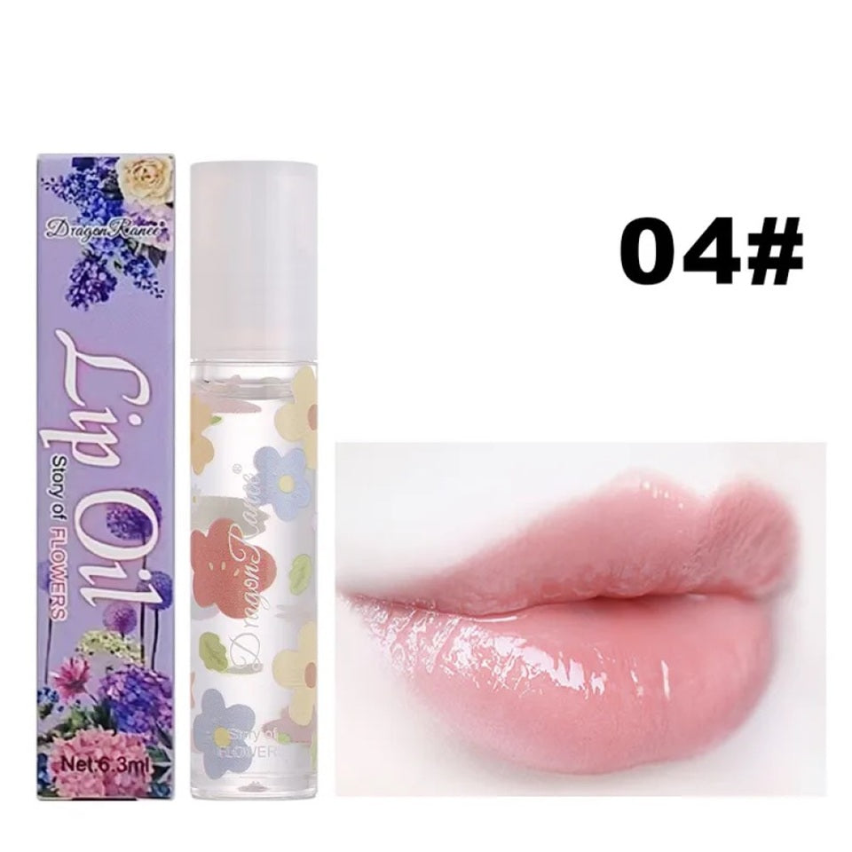 des huiles pour les lèvres aux doux doux parfums de fleurs. Les tubes sont colorés et en verre avec un design de fleurs.