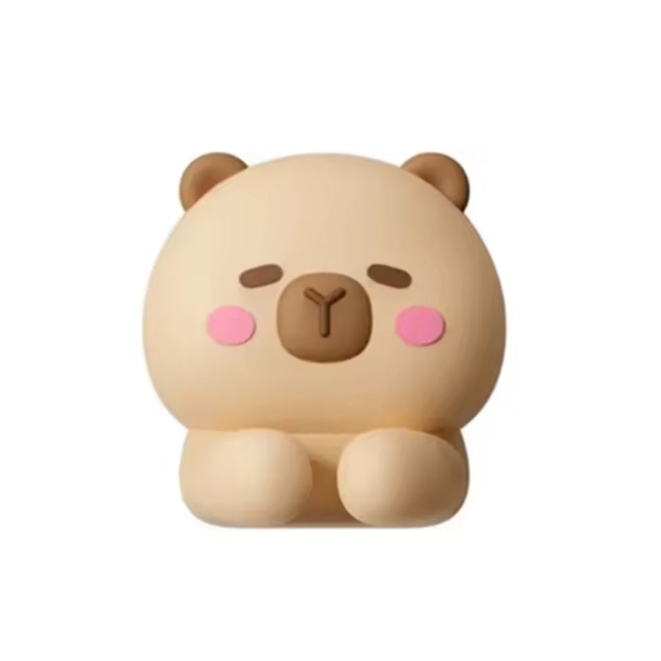 un organisateur en forme de capybara, utile pour toujours bien ranger vos câbles.