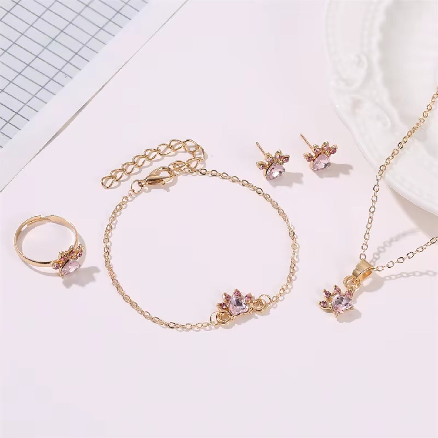 Parure de bijoux pattes de chat roses