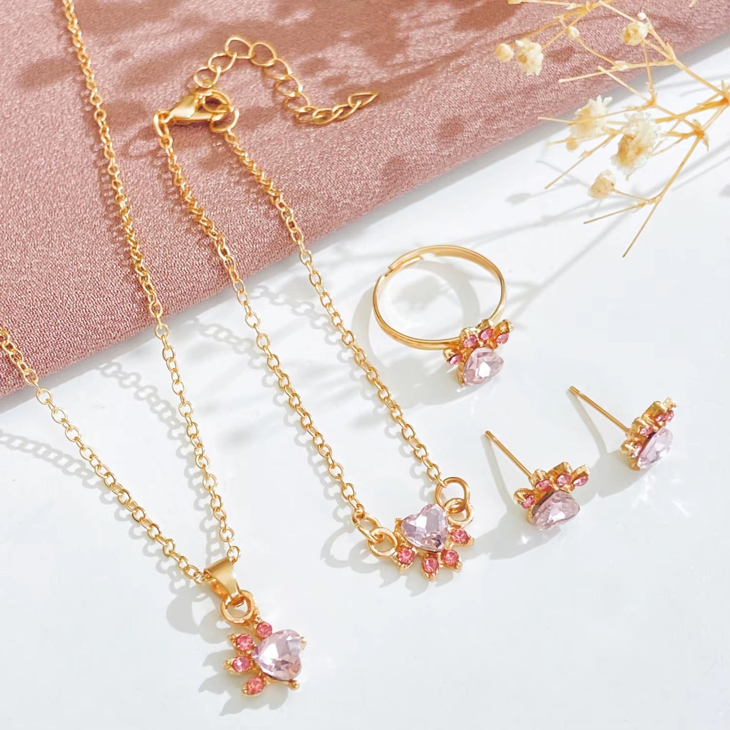 Parure de bijoux pattes de chat roses