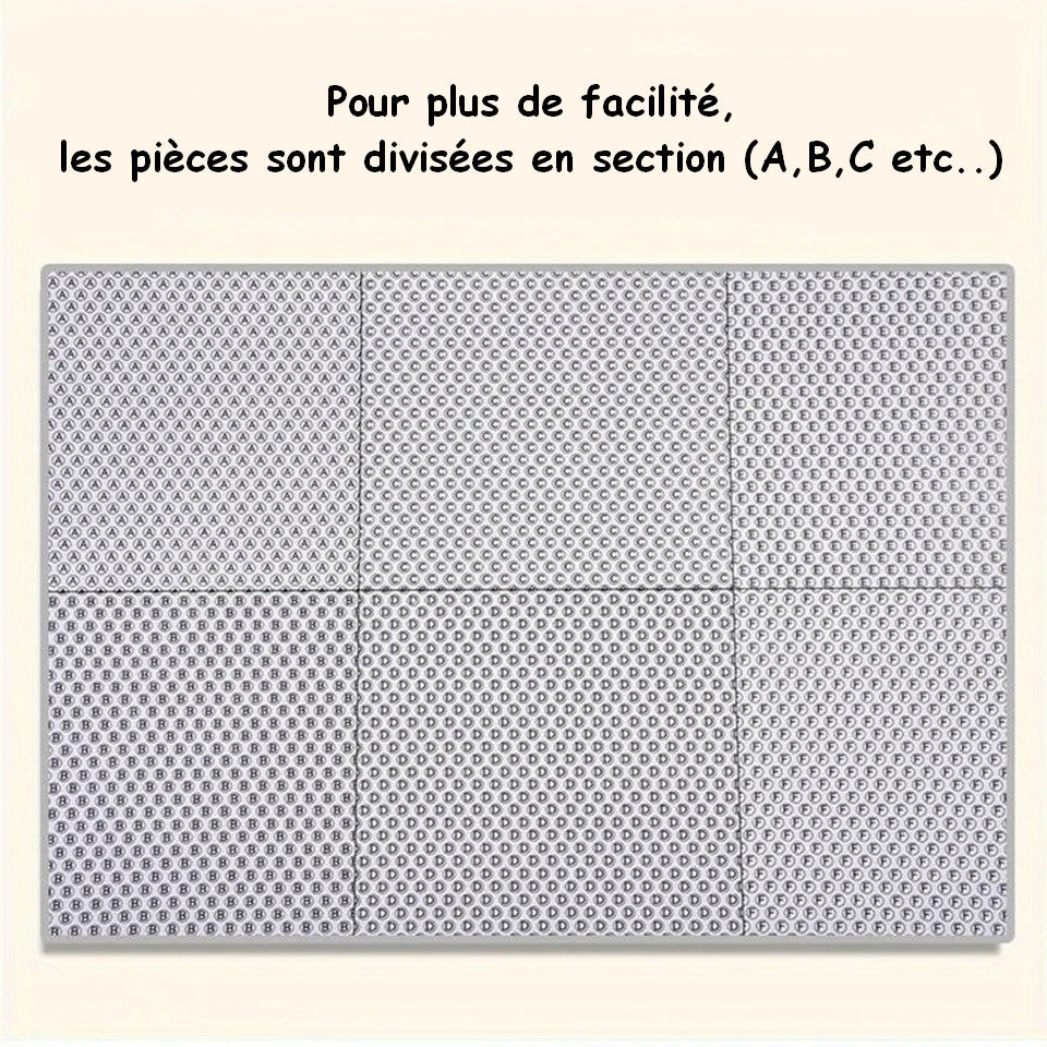 un puzzle composé de 1000pièces reprenant la scène où Mei, Satsuki, Totoro et les chibi pêchent sur une grosse branche d'arbre.