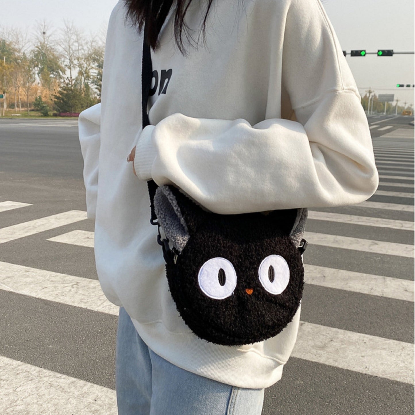 Sacoche peluche Jiji