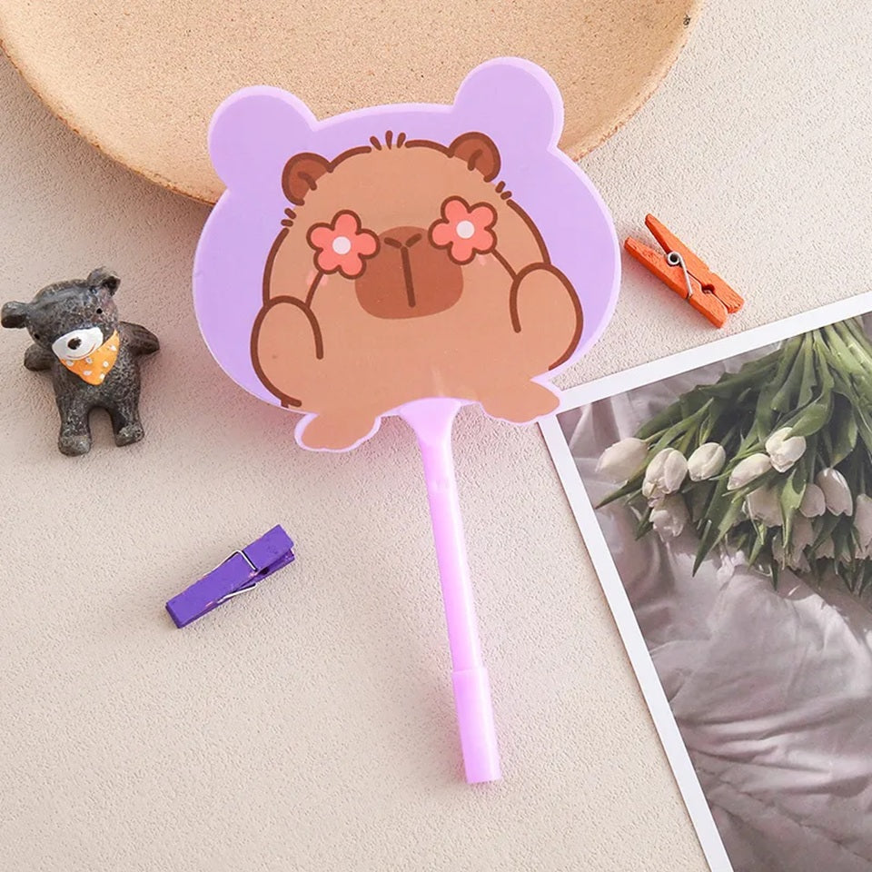 des stylos en forme de capybara tout mignons et colorés. Avec leur design original et adorables, ils apportent gaieté et mignonnitude à votre bureau.
