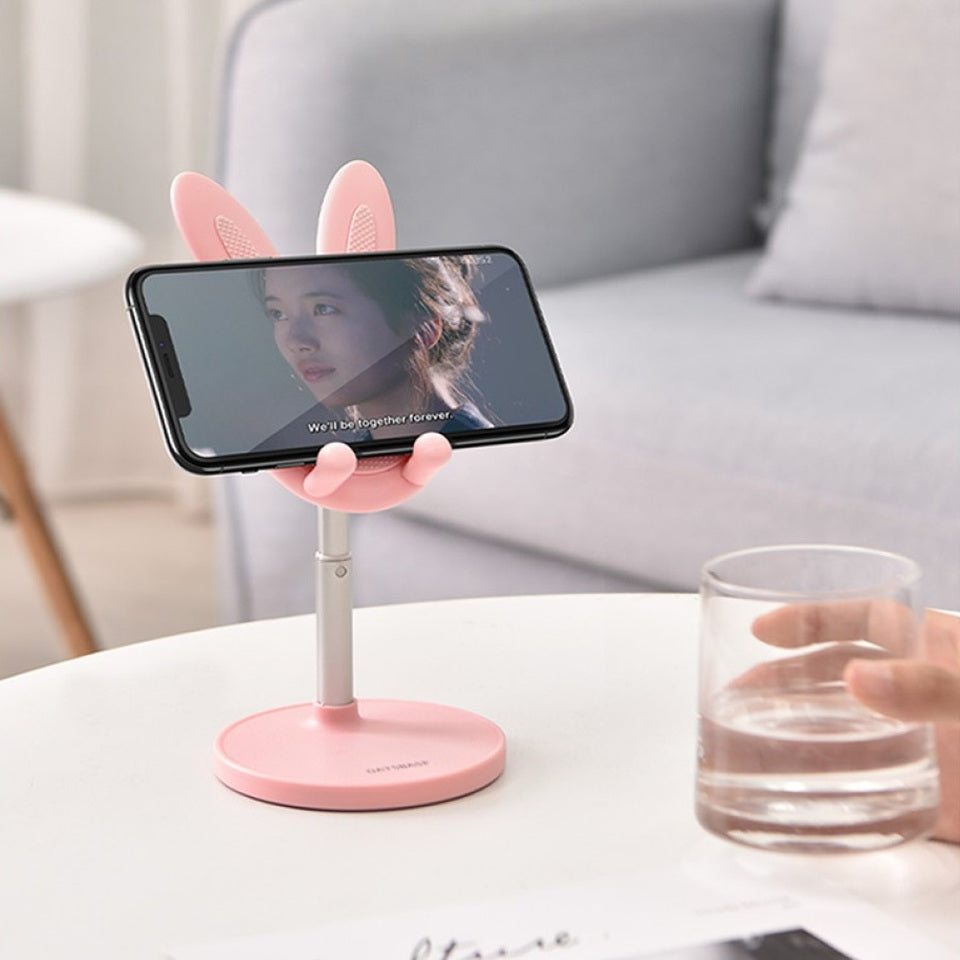 un support pour smartphone et tablette doté d'oreilles de lapin toutes choupi. Il est télescopique et s'adapte à tous les appareils. Idéal également élément de décoration