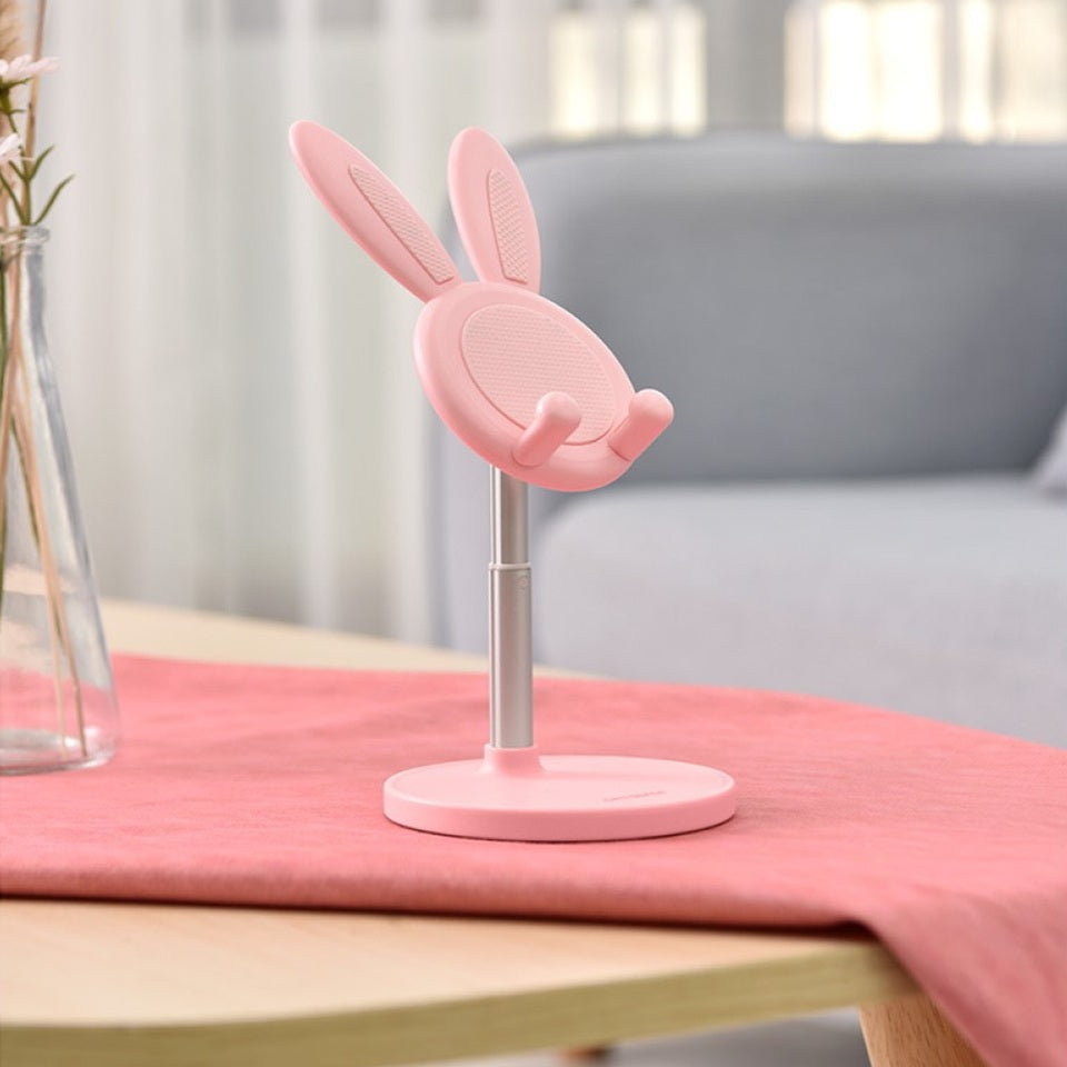 un support pour smartphone et tablette doté d'oreilles de lapin toutes choupi. Il est télescopique et s'adapte à tous les appareils. Idéal également élément de décoration