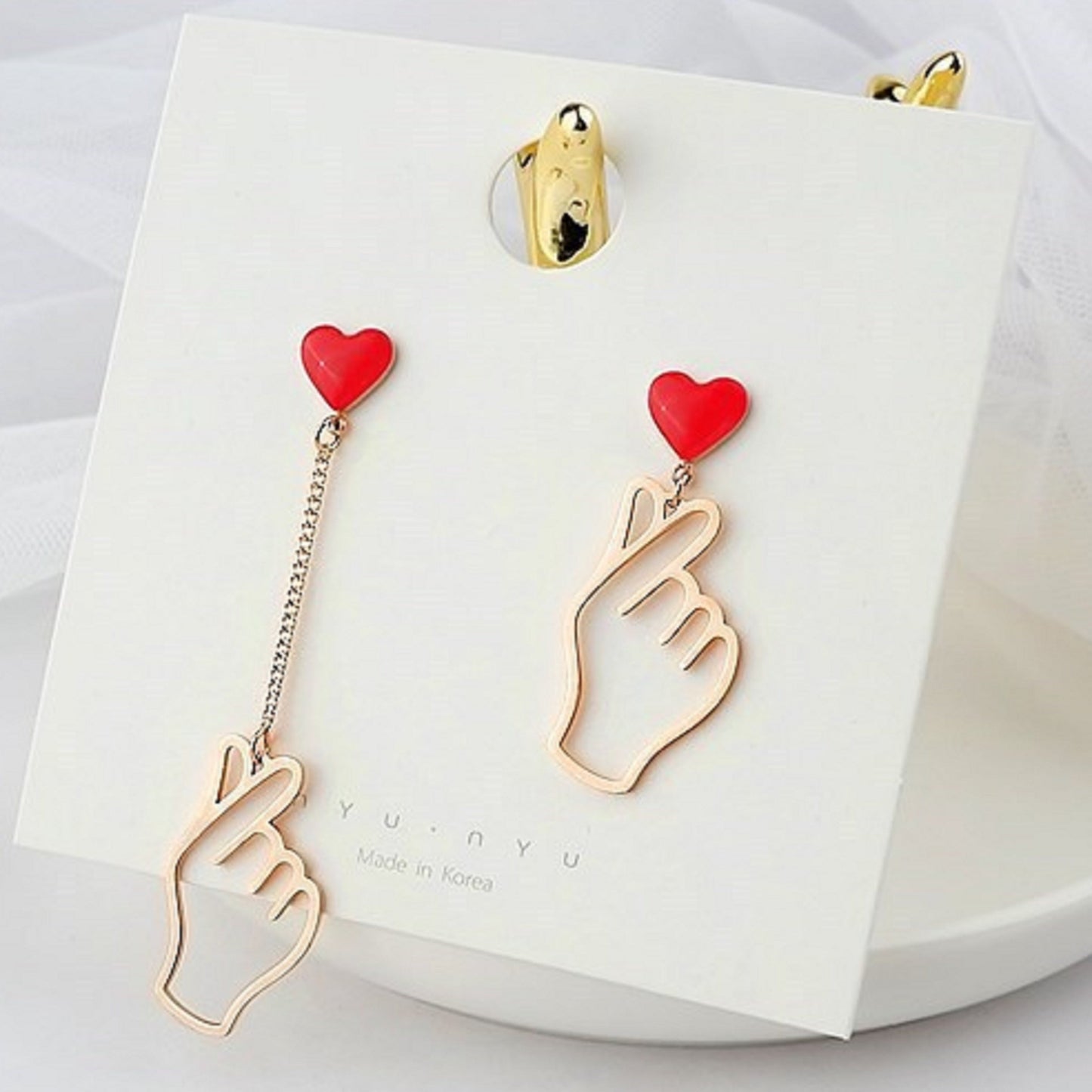 Boucles d'oreilles finger heart