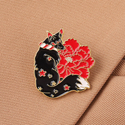 Pin's renard et fleur rouge