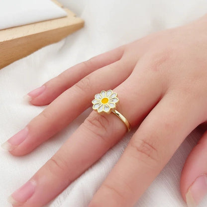 Bague rotative marguerite