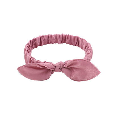 des bandeaux pour cheveux vert, violet ou rose ornés d'un petit noeud tout mignon. Taille élastique.