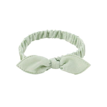 des bandeaux pour cheveux vert, violet ou rose ornés d'un petit noeud tout mignon. Taille élastique.
