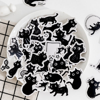 Boite de stickers chats noirs