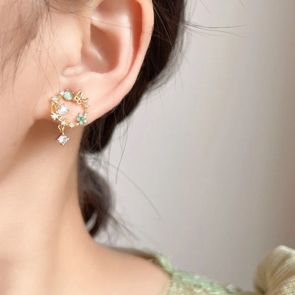 Boucles d'oreilles ronde de papillons et strass