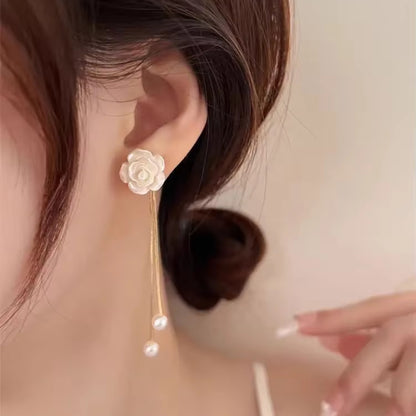 Boucles d'oreilles roses blanches et perles