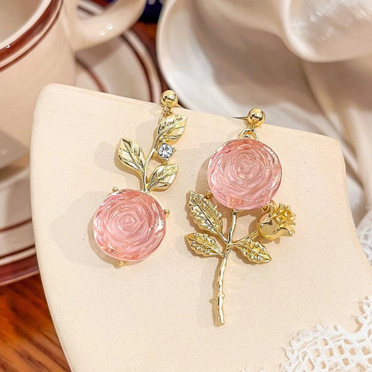 Boucles d'oreilles roses dorées