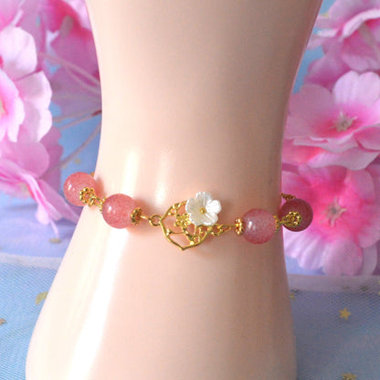 Bracelet sakura et perles roses