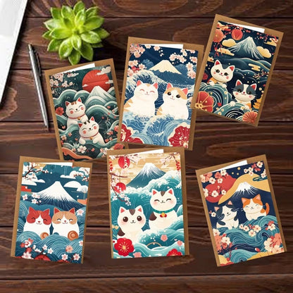 des cartes de voeux toutes mignonnes représentant des chats sur un fond de paysage japonais : vague, mont fuji et fleurs de sakura façon estampe japonaise.