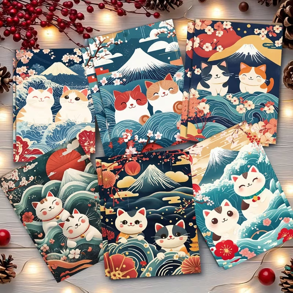 des cartes de voeux toutes mignonnes représentant des chats sur un fond de paysage japonais : vague, mont fuji et fleurs de sakura façon estampe japonaise.