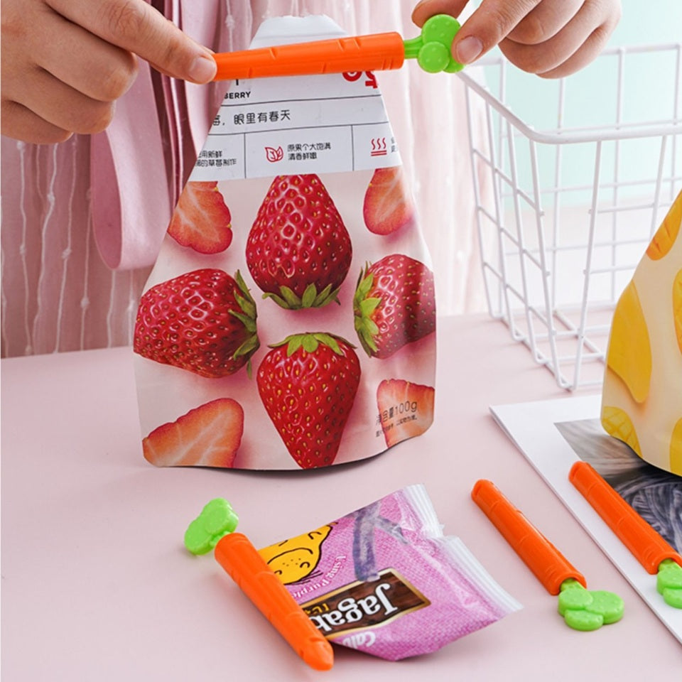 lot de 2 pinces en forme de carottes pour refermer hermétiquement tous vos sachets.