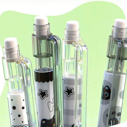 gros plan sur l'embout gomme des critériums noirs et blancs au design de chats façon chibi, idélas  pour le dessin et l'écriture.