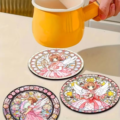 des dessous de verre en bois de superbes illustrations de Sakura Kinomoto de Card Captor Sakura. Elle a ses ailes blanches et est vêtue d'une belle robe rose élégante. Idéal pour les apéros entre amis, pour ne pas tâcher la table.