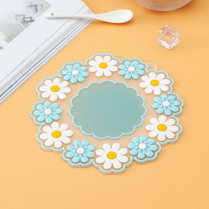 des dessous de verre formés d'une jolie ronde marguerites. En silicone, ils protègent toutes vos surfaces. Ils ajoutent une touche florale et décorative à votre table.