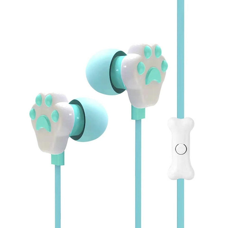 des écouteurs en forme de patte d'animaux en coloris vert. Hyper mignons, ils peuvent être rangés dans leur étui oreilles de chat. L'ensemble est trop mignon et hyper pratique.