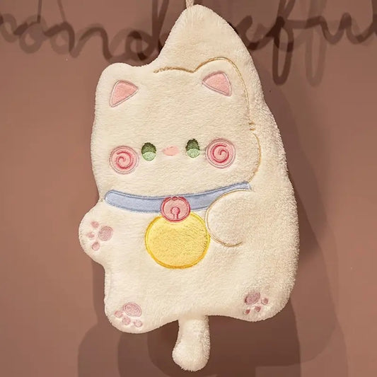 un essuie main tout doux en forme de chat blanc kawaii. il a une bouille adorable, on peut l'accrocher au mur. Pratique et utile au quotidien.