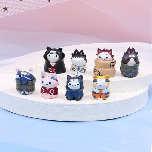 Les personnages du manga Naruto sous forme de chats hyper stylés et mignons. Kakashi, Naruto, Sakura, Gaara, Sasuke, Shikamaru, Iruka et Itachi sont adorables avec leurs habits respectifs et leurs signes distinctifs