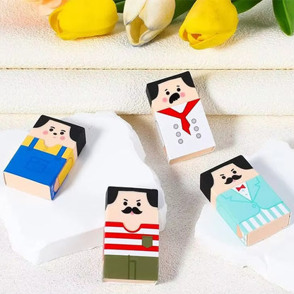 Des gommes de forme rectangulaire représentant des monsieur moustachus aux cheveux noirs. Au fur et à mesure des utilisations, le monsieur devient chauve ! Ludique, amusante à utiliser !