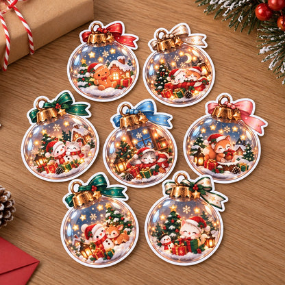 Lot de 6 stickers kawaii de Noël en forme de boules de sapin, illustrés d'adorables animaux avec bonnets de Noël, lapins, ourson et bonhomme de neige, entourés de cadeaux, sapins enneigés et maisons illuminées. Autocollants festifs aux jolis rubans colorés, parfaits pour décorer cartes de vœux, paquets cadeaux, carnets et créations DIY.