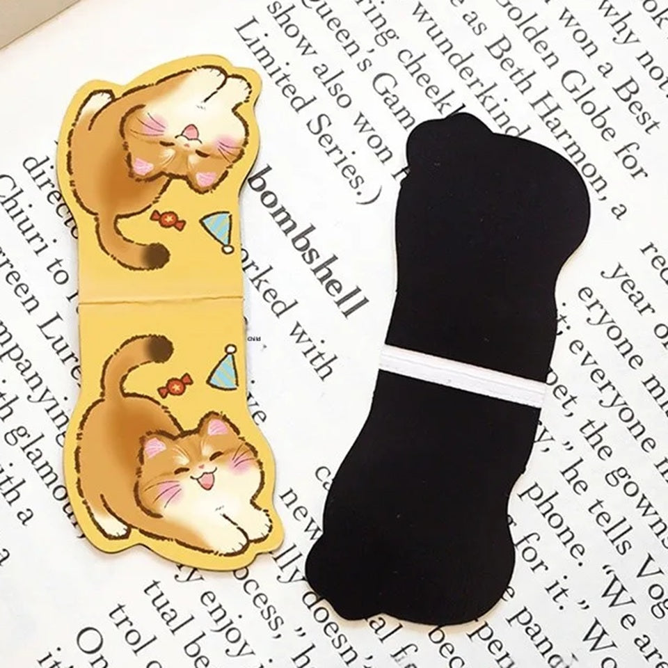 Un lot de 2 marque-pages aimantés en forme de chat roux. Ils sont trop mignons avec leurs expressions adorables. Un est à l'envers pour montrer le côté aimanté.