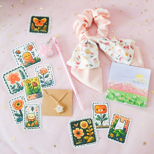 Un lot kawaii sur le thème des fleurs : accessoire de mode, papeterie, bijou. C'est une vraie invitation dans un jardin fleuri.