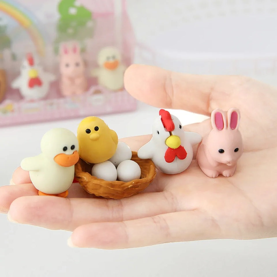 un lot de 4 gommes animaux de la ferme : poule, poussin et oeuds, lapin et canard. Formes originales et adorables