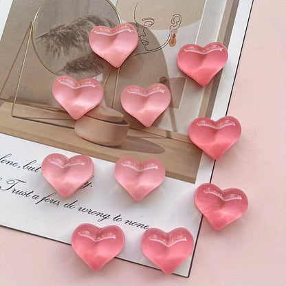 un lot de 4 magnets en acrylique en forme de coeur rose hyper mignon.