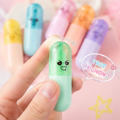 Détail des surligneurs gélules kawaii, expressions amusantes et couleurs pastel douces 🌈
