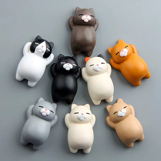 des magnets très mignons en forme de chats colorés et bien dodus avec leur gros ventre.