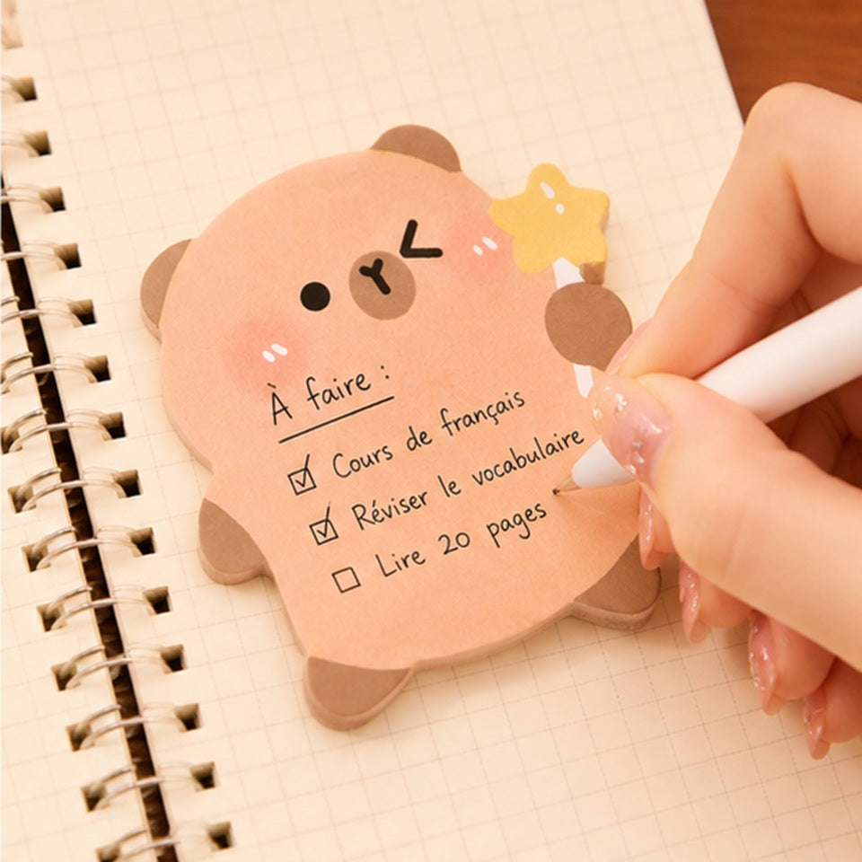 Mémo adhésif capybara kawaii posé sur un bureau, pratique pour les rappels et petits messages ✨