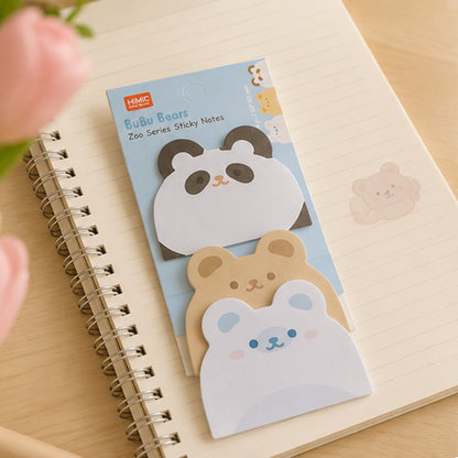 Bloc de notes adhésives kawaii BuBu Bears en forme de panda et d’oursons, présenté sur un carnet à spirale dans un décor de papeterie doux et pastel.