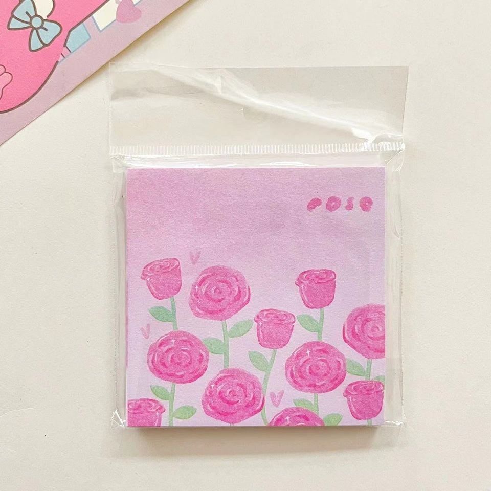 un mémo adhésif représentant de jolies roses roses. Idéal pour laisser des petits mots, des notes avec une touche florale et mignonne.