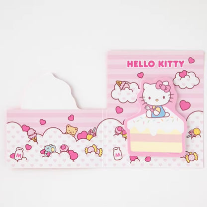 un duo de mémos adhésifs sur les personnages Sanrio: Kuromi, My Melody, Cinnamoroll, Hello Kitty et Pompompurin. Dans un petit livret décoré, deux modèles différents de mémos illustrés des personnages Sanrio.