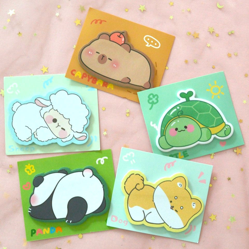 des mémos en forme d'animaux mignons : capybara, chat, chien, lapin, tortue, cochon, panda et mouton. Idéal pour égayer la papeterie