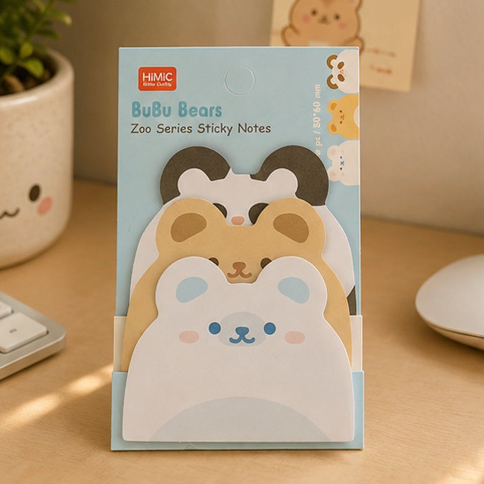 Bloc de notes adhésives kawaii BuBu Bears avec adorables ours, présenté sur un bureau en bois dans un décor pastel avec plante.