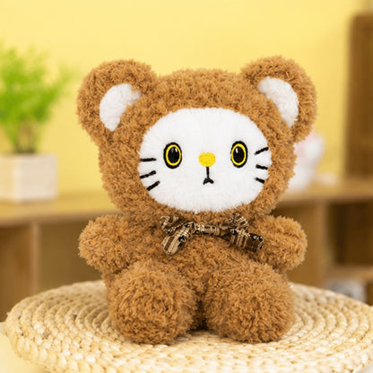 Peluche kawaii chat déguisé en ourson, ultra moelleuse avec grands yeux expressifs et petit nœud 🐻